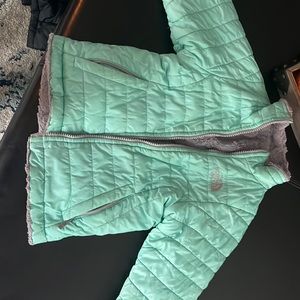 North face fleece reversible, some discoloring on sleeves from wear see pic